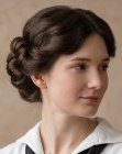 Penteado com um coque tran�ado